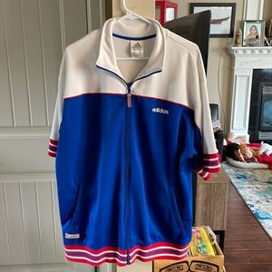 Short sleeve adidas track jacket.